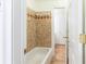 Bright bathroom with a tiled shower-tub combination at 1634 Ponce De Leon Ne Ave # 506, Atlanta, GA 30307