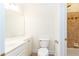 Modern bathroom vanity with a toilet, and tiled shower-tub combination at 1634 Ponce De Leon Ne Ave # 506, Atlanta, GA 30307