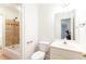 Clean, well-lit bathroom with vanity, toilet, and tiled shower-tub combination at 1634 Ponce De Leon Ne Ave # 506, Atlanta, GA 30307