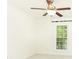 Bright bedroom featuring a ceiling fan and window providing natural light at 1634 Ponce De Leon Ne Ave # 506, Atlanta, GA 30307