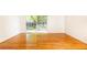 Living room featuring hardwood floors and sliding doors leading to outdoor patio at 1634 Ponce De Leon Ne Ave # 506, Atlanta, GA 30307