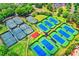 Aerial view of the community tennis center with well-maintained courts at 2644 Nutwood Trce, Duluth, GA 30097