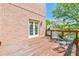 Back deck area with two chairs for relaxing on a sunny day at 2644 Nutwood Trce, Duluth, GA 30097