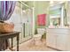 Bright bathroom with a glass-enclosed shower, vanity and tasteful decor at 2644 Nutwood Trce, Duluth, GA 30097