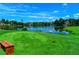 Scenic golf course with a picturesque water feature and lush green landscape at 2644 Nutwood Trce, Duluth, GA 30097