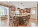 Gourmet kitchen featuring a large island, hardwood floors and an open layout at 2644 Nutwood Trce, Duluth, GA 30097