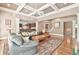 Open floor plan featuring a living room that flows to kitchen and stairs at 2644 Nutwood Trce, Duluth, GA 30097