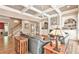 Comfortable living room with coffered ceilings, fireplace and hardwood floors at 2644 Nutwood Trce, Duluth, GA 30097