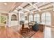 Cozy living room with coffered ceilings, fireplace, and built-in shelving at 2644 Nutwood Trce, Duluth, GA 30097