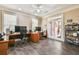 A functional office space features tile floors, natural light, and backyard access at 2644 Nutwood Trce, Duluth, GA 30097