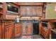 This convenient wet bar offers a microwave, dishwasher and a handy drink cooler at 2644 Nutwood Trce, Duluth, GA 30097