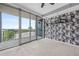 Bedroom boasts floor to ceiling windows with access to a private balcony at 3338 Peachtree Ne Rd # 1010, Atlanta, GA 30326