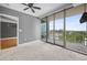 Carpeted bedroom with balcony access and city views through sliding glass doors at 3338 Peachtree Ne Rd # 1010, Atlanta, GA 30326