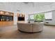 Resident lounge with a large sectional sofa, TV, and outdoor views at 3338 Peachtree Ne Rd # 1010, Atlanta, GA 30326
