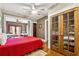 Inviting bedroom with hardwood floors, decor, french doors to a porch, and a closet at 698 Bellemeade Nw Ave, Atlanta, GA 30318