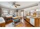 Gourmet kitchen featuring a large island, farmhouse sink, and stainless steel appliances at 698 Bellemeade Nw Ave, Atlanta, GA 30318