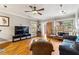 Well-lit living room featuring hardwood floors, warm paint colors, and cozy seating at 698 Bellemeade Nw Ave, Atlanta, GA 30318
