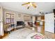 Open concept living and dining space featuring hardwood floors, ample lighting and ceiling fans at 698 Bellemeade Nw Ave, Atlanta, GA 30318