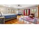 Spacious main bedroom with wood floors, shutters and a view to the property grounds at 698 Bellemeade Nw Ave, Atlanta, GA 30318