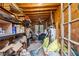 Storage room featuring wood walls, ceiling fan, french doors, and shelves at 698 Bellemeade Nw Ave, Atlanta, GA 30318