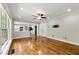 Bright and airy living room, showcasing the open floor plan that connects seamlessly to the kitchen at 7260 Foxberry Ct, Cumming, GA 30041