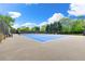 Community tennis court offers residents recreation and leisure activities at 7260 Foxberry Ct, Cumming, GA 30041