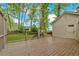 Spacious back deck overlooking the backyard and surrounding trees at 151 Mark Se Ln, Smyrna, GA 30082