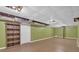 Unfinished basement space showcasing ample room for storage or customization at 151 Mark Se Ln, Smyrna, GA 30082