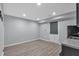 Basement kitchenette area with modern appliances and light-colored flooring for a contemporary look at 151 Mark Se Ln, Smyrna, GA 30082