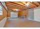 Unfinished basement with a garage door and lots of potential for storage at 151 Mark Se Ln, Smyrna, GA 30082