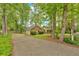 Home with driveway, garage, and landscaping at 151 Mark Se Ln, Smyrna, GA 30082