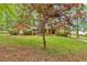 Charming home with a brick facade and mature trees in a serene setting at 151 Mark Se Ln, Smyrna, GA 30082