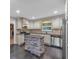 Bright eat-in kitchen with stainless steel appliances and island at 151 Mark Se Ln, Smyrna, GA 30082