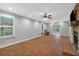 Spacious living room with a brick-laid floor and a cozy fireplace at 151 Mark Se Ln, Smyrna, GA 30082