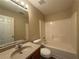 Clean bathroom with a shower-tub combo and a vanity at 16 Grandview Ct, Powder Springs, GA 30127