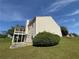 Back exterior view featuring a covered back deck perfect for enjoying the outdoors at 16 Grandview Ct, Powder Springs, GA 30127