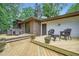 View of the multi-level deck with outdoor seating and access to the house at 2687 Goodfellows Rd, Tucker, GA 30084