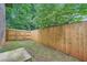 Exterior view of the side yard with privacy fence at 2687 Goodfellows Rd, Tucker, GA 30084