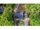 Aerial view of the home's layout and landscaping among the trees at 3270 Brookview Dr, Marietta, GA 30068