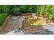 Large fenced back yard with hot tub, patio space, and exercise area at 3270 Brookview Dr, Marietta, GA 30068