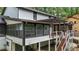 Close up showing expansive backyard features a multi-tiered deck, and screened-in porch at 3270 Brookview Dr, Marietta, GA 30068