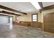 Finished basement offers updated floors, an exterior door, and bench seating underneath the windows at 3270 Brookview Dr, Marietta, GA 30068