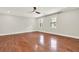 Spacious bedroom with hardwood floors, two large windows, and neutral paint at 3270 Brookview Dr, Marietta, GA 30068