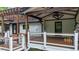 Expansive wooden deck has a white railing and plenty of room for seating and entertaining at 3270 Brookview Dr, Marietta, GA 30068