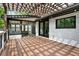 Wooden deck with a pergola provides lots of natural light from the windows and sliding glass doors at 3270 Brookview Dr, Marietta, GA 30068