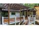 Back deck features a wooden pergola and overlooks the landscaped backyard at 3270 Brookview Dr, Marietta, GA 30068