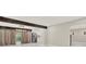 Open concept dining room showcasing neutral paint, white marble floors, rustic wood beam and stainless steel fridge at 3270 Brookview Dr, Marietta, GA 30068