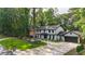 Charming two-story home with mature trees, lovely lawn, and spacious driveway at 3270 Brookview Dr, Marietta, GA 30068