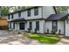 Two-story home with brick and vinyl siding and manicured landscaping at 3270 Brookview Dr, Marietta, GA 30068