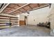 Spacious garage offers shelving on the left and ample room for parking and storage at 3270 Brookview Dr, Marietta, GA 30068